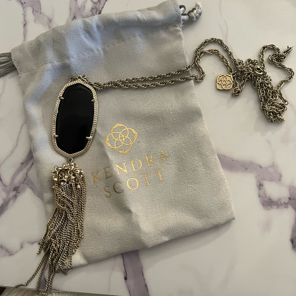 Kendra Scott long chain gold and black tassel necklace